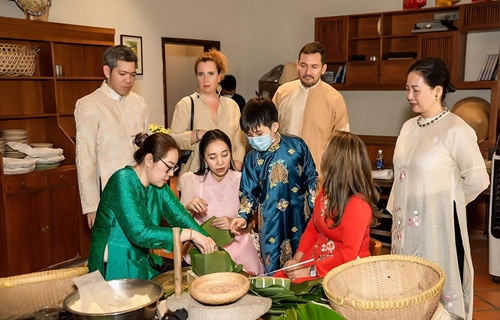 International friends enjoy Vietnamese traditional Tet